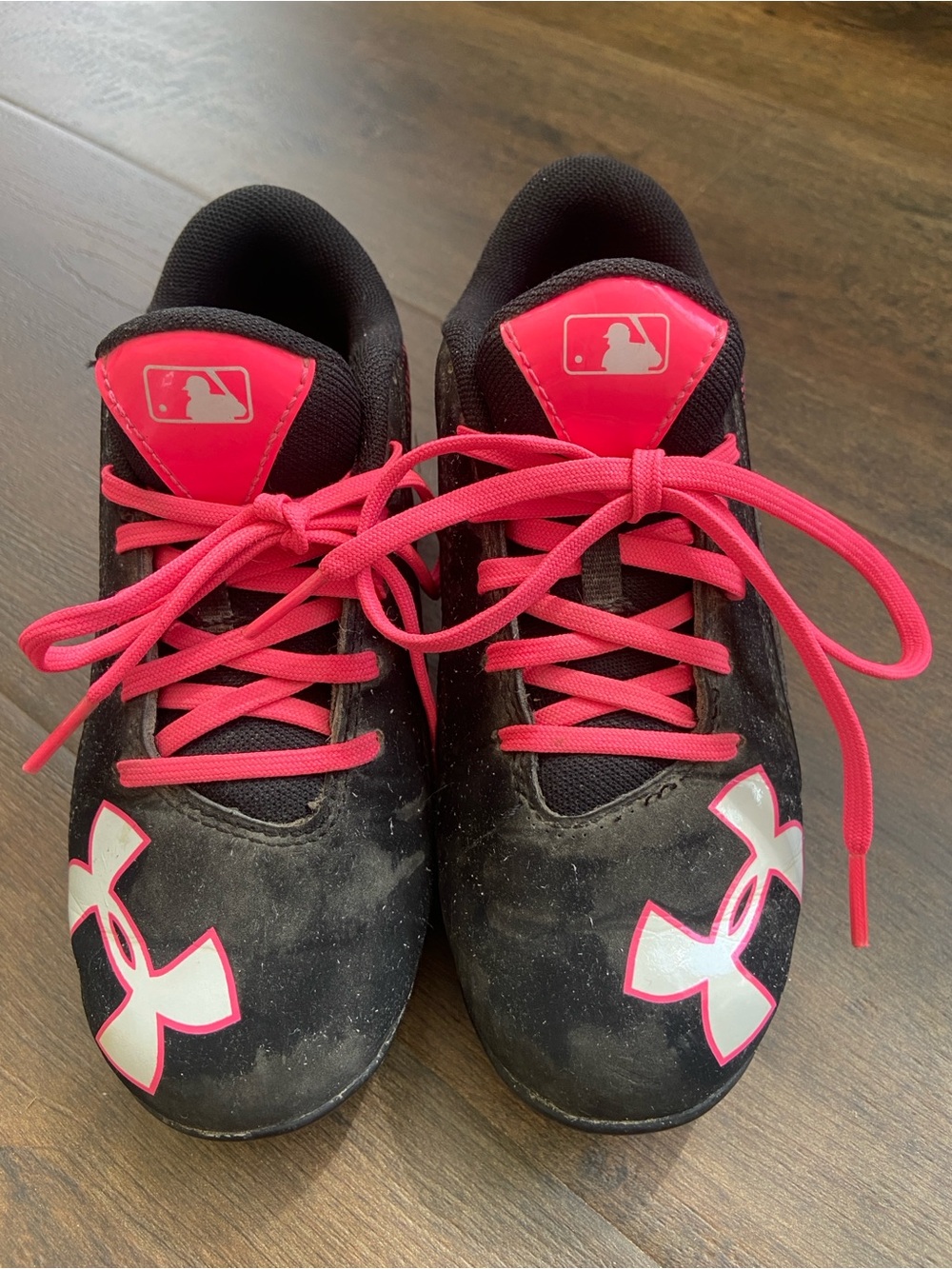 Under Armour Kids Black with Pink baseball cleats Size 1Y